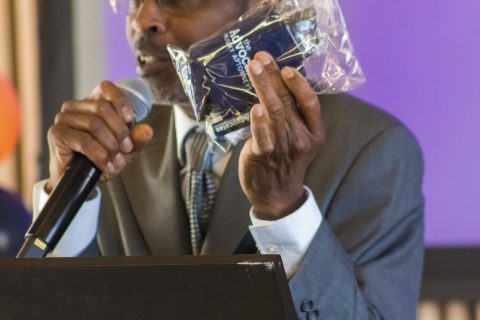 Speaker addressing attendees at the lectern at GEW Utah 2025